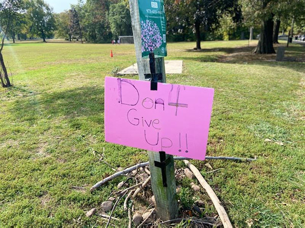 Students created motivational signs to post around the park
