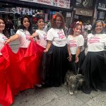 Betsy Bermudez Crespo, Arts High School Recreational Coordinator and Assistant Band Director, far right, and the rest of the Arts High School Latin Band Dancers.