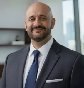 A picture of Vice Principal Salek in a suit