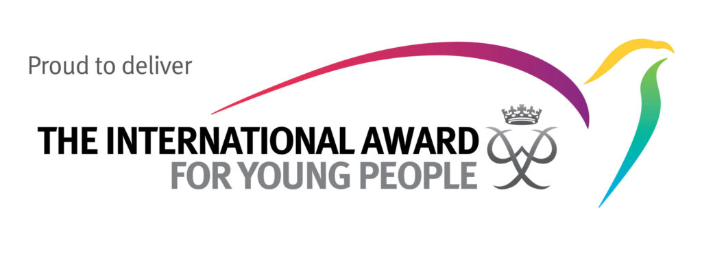 This picture says "Proud to Deliver the International Award for Young People" for the Duke of Edinburgh club. This picture also has a logo for the award.