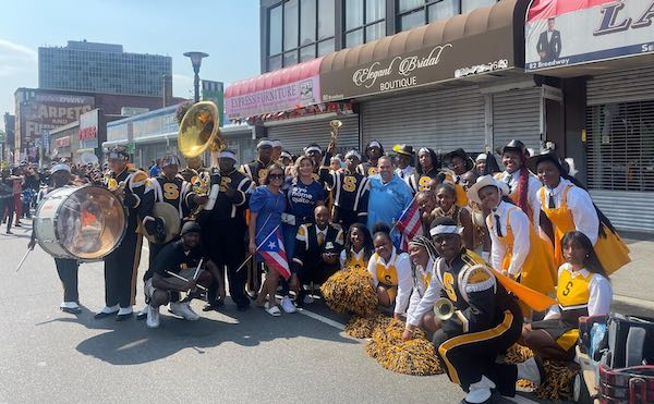 Superintendent León with Board Member Josephine C. Garcia, Band Director Sheffield, and the Malcolm X Shabazz Marching Band
