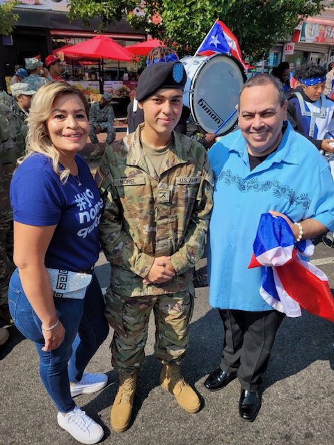 Superintendent León and Board Member Josephine C. Garcia recognize Army Reserve graduate Ricardo Morel from Barringer High School