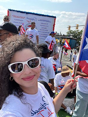 Board Member Santana celebrates with the community at the Puerto Rican Day Parade