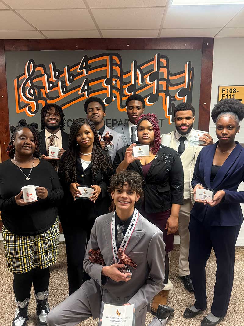 From left, Laylah Germany, Tariff Single, Dakota Creath, Dante Elliott, Joshua Akerele, Belonica Maceno, Luis Franco, JazzLee Usher. Kneeling in front, Josmanuel DeLeon.