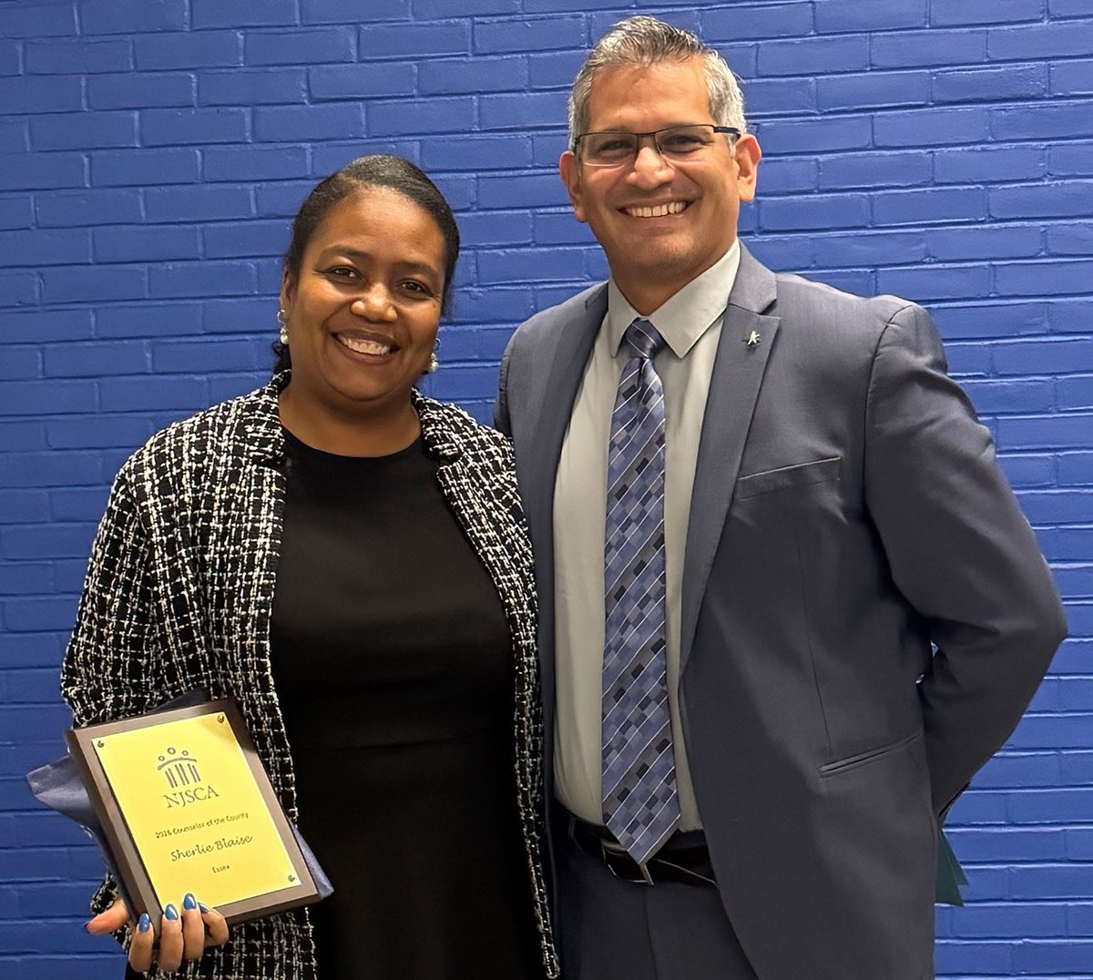 Sherlie Blaise, 2026 Essex County Counselor of the Year, and Dr. Claudio Barbaran, Principal of the Roberto Clemente School.
