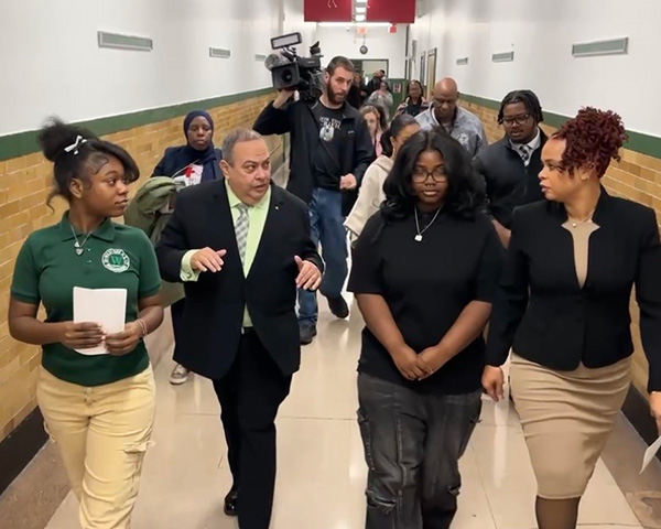 Nakira Poole, far left, as part of the group that welcomed Superintendent León to the official opening of the 403 Salon & Spa.