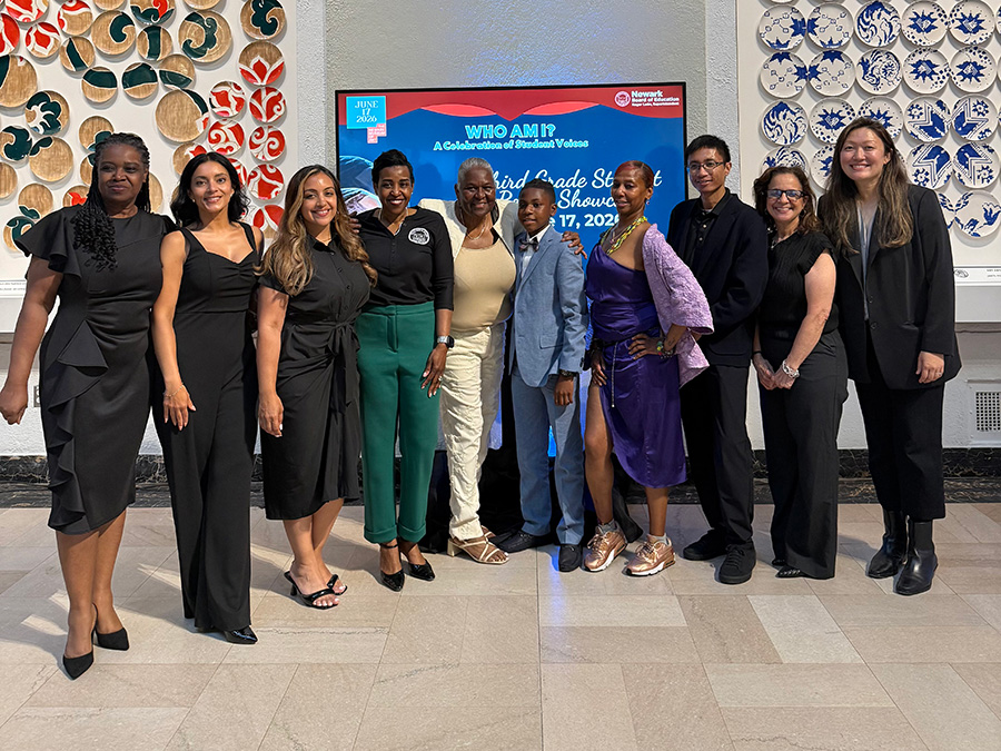 From left, ELA Clerk Stephanie Walsh, ELA Supervisor Stephanie Francisco, ELA Director Jazleen Othman, Deputy Superintendent Yolonda Severe; Jackie Hern, grandmother of Kayden Hern, New York State Poet Laureate and Author Kayden Hern; Cici Hern, aunt of Kayden Hern, ELA Supervisors George Salazar, Lisa Trobaugh, and Elisa Lee.