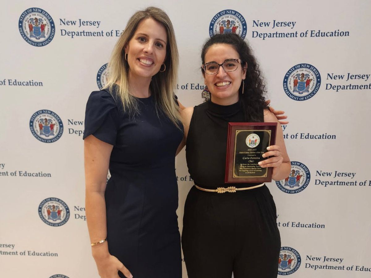 Principal Soraia Mendes, left, and Essex County Teacher of the Year Carla Ferreira