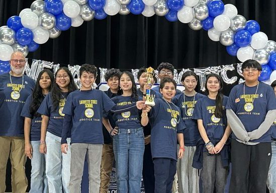 Abdullah Ansari, far left, and the first-place winning Lafayette Street School Robotics Team.
